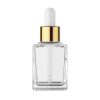 Clear Glass Bottle with Gold Dropper